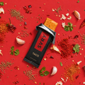 SYVR Taco protein bar surrounded by spices and herbs on a red background