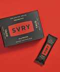 SVRY savory protein bar packaging on a red background