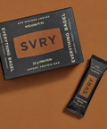 SVRY protein bar packaging on a brown background